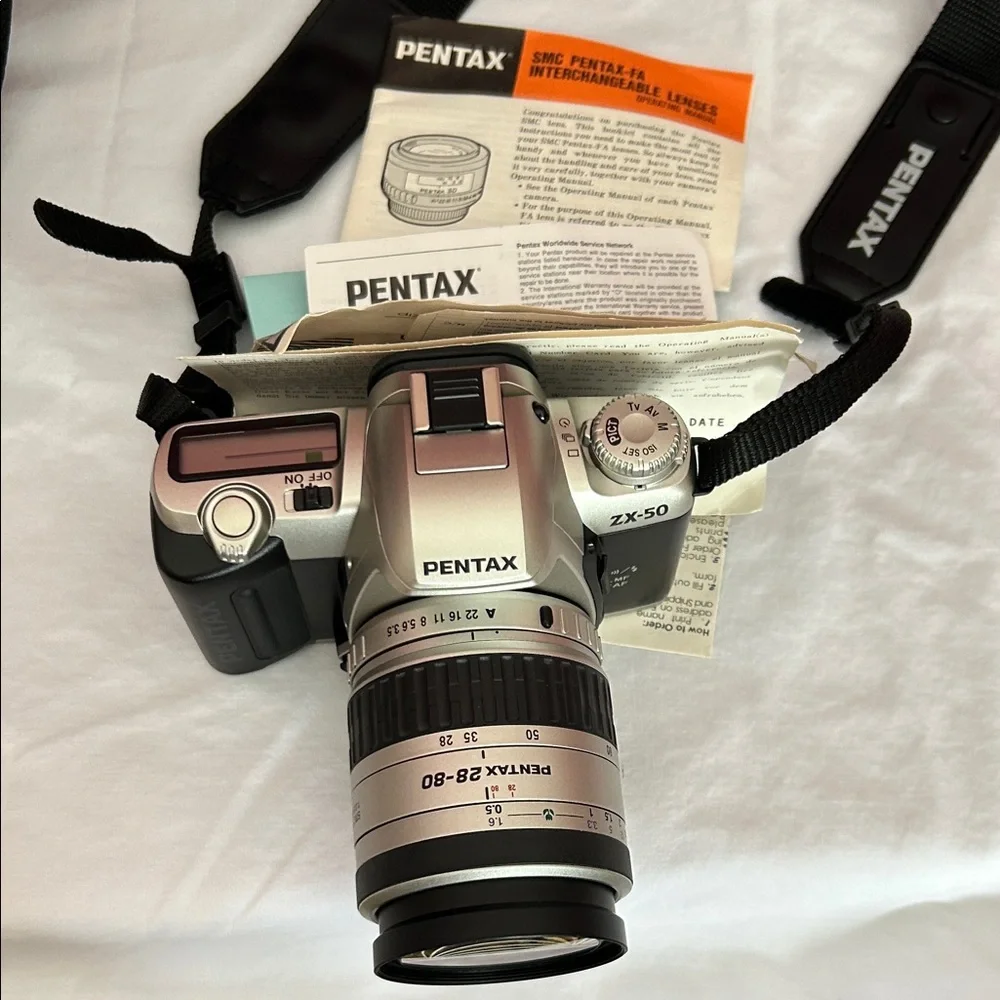 Pentax ZX-50 Black and Silver Digital Camera with Strap